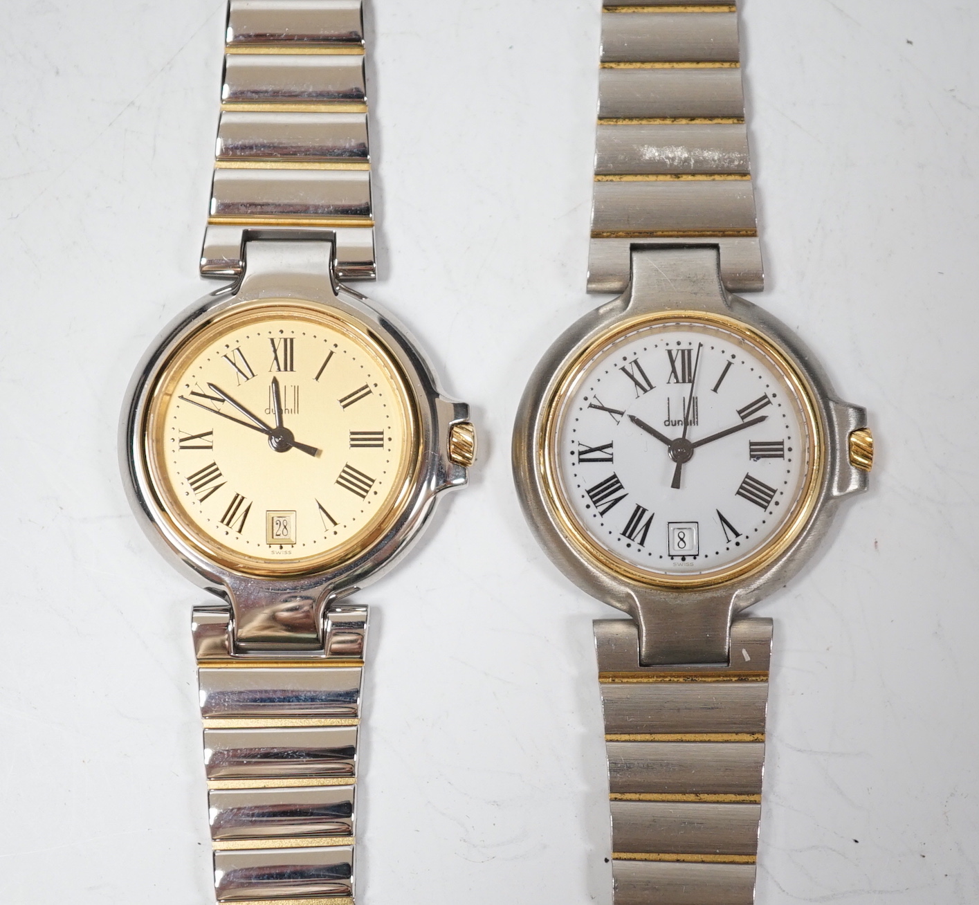 Two lady's steel and gold plated Dunhill quartz wrist watches, one with Dunhill box.